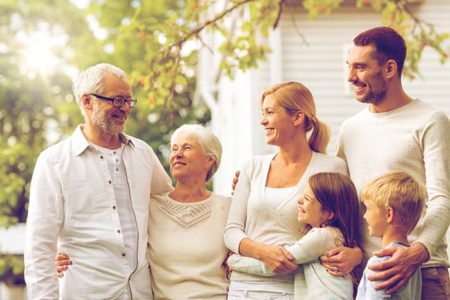 family walking outdoors with grandparents