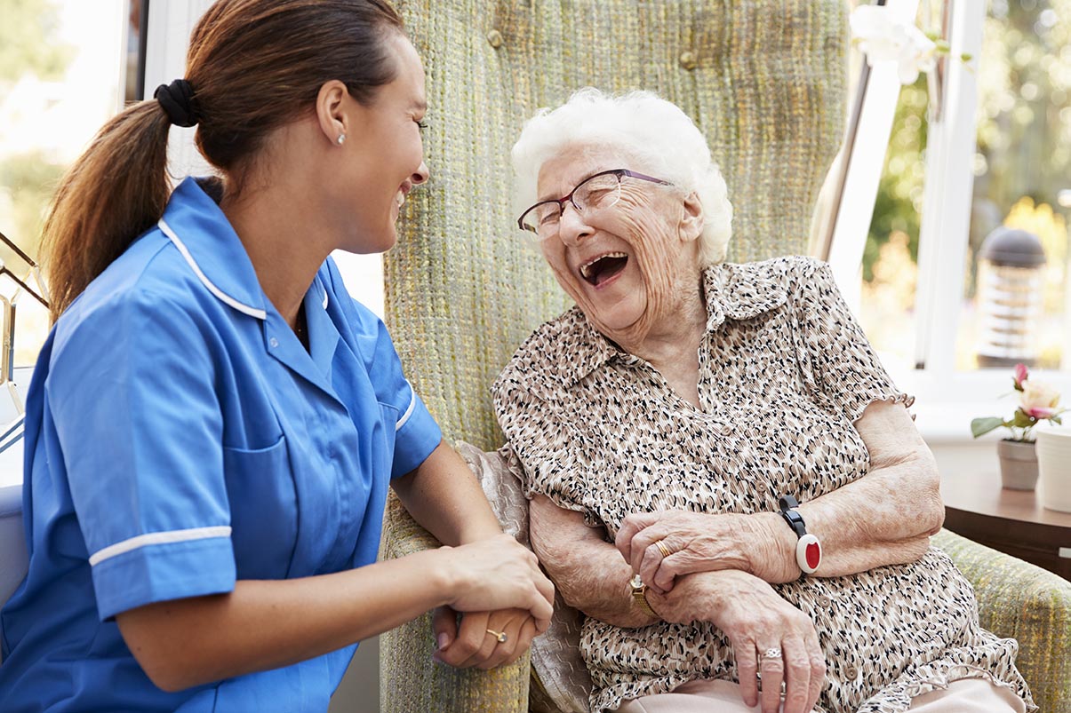 caregiver visits with senior lady